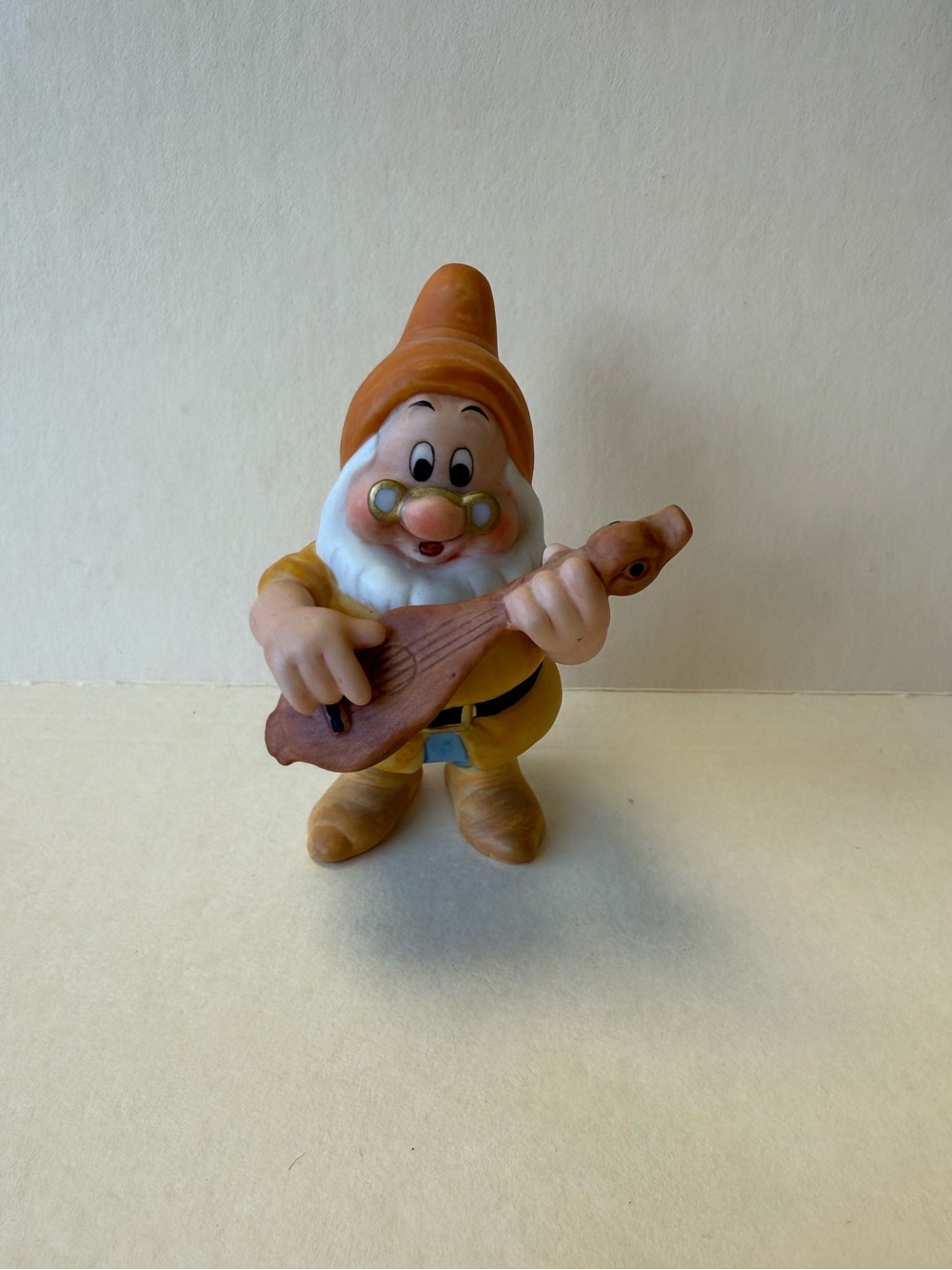 Vintage Disney Porcelain Bisque Snow White Doc Figurine with Lute.